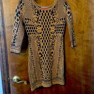 Gold and black sweater mini dress